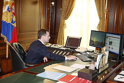 Person recording a video message (video blogging)