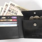 A small Japanese wallet photographed on a table.