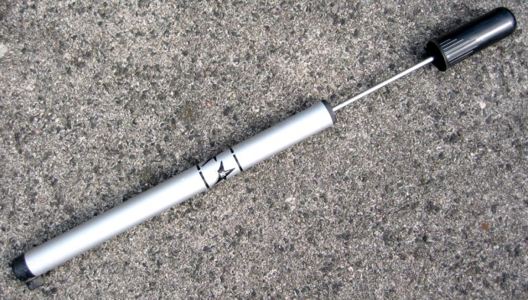 Hand bicycle pump standing upright