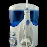 Handheld water flosser (oral irrigator)