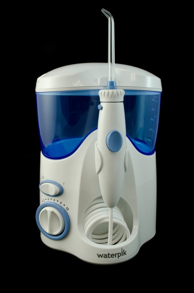 Handheld water flosser (oral irrigator)