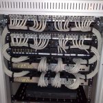 Ethernet cables and patch panels in a rack
