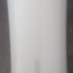 Stainless travel mug on a table