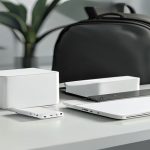 AI-generated comparison of unbranded compact wall-charger power bank and slim laptop-style power bank