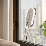 Generic robotic window cleaner attached to an apartment window
